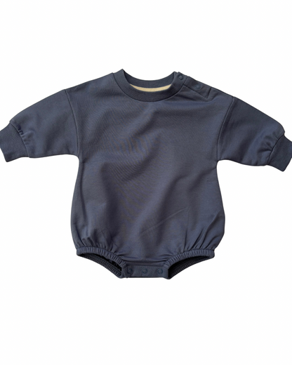 Navy blue baby romper on a white background