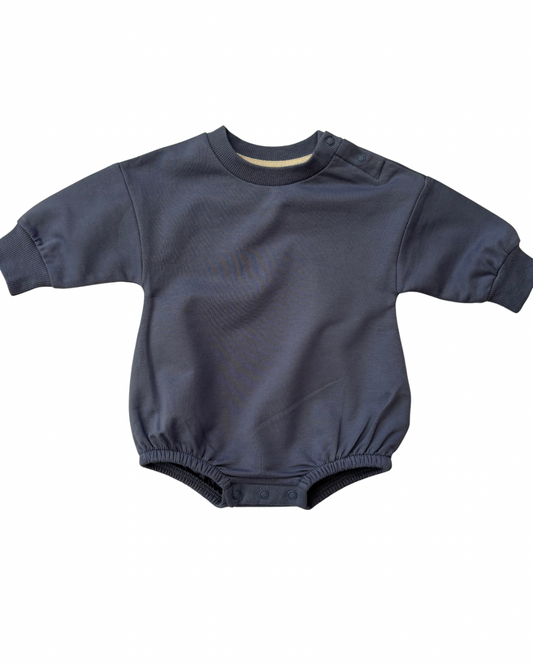 Navy blue baby romper on a white background